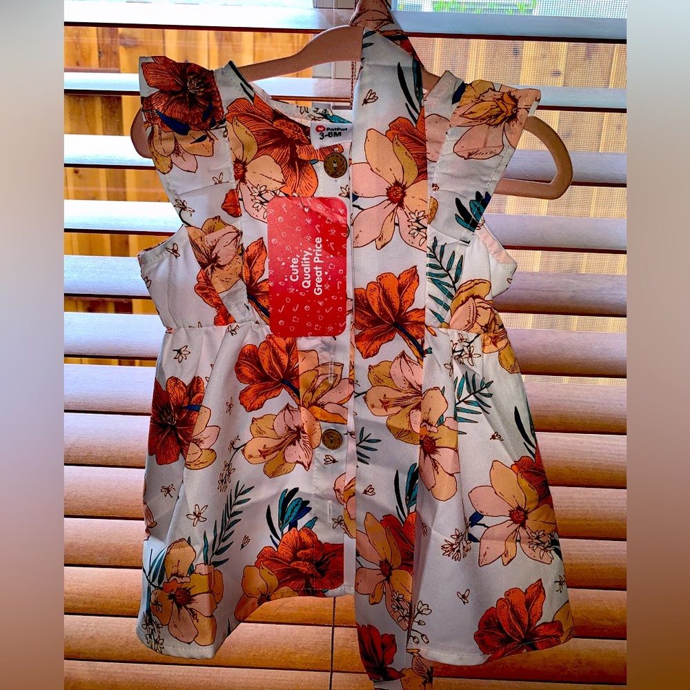 Brand new/unworn autumn baby dress